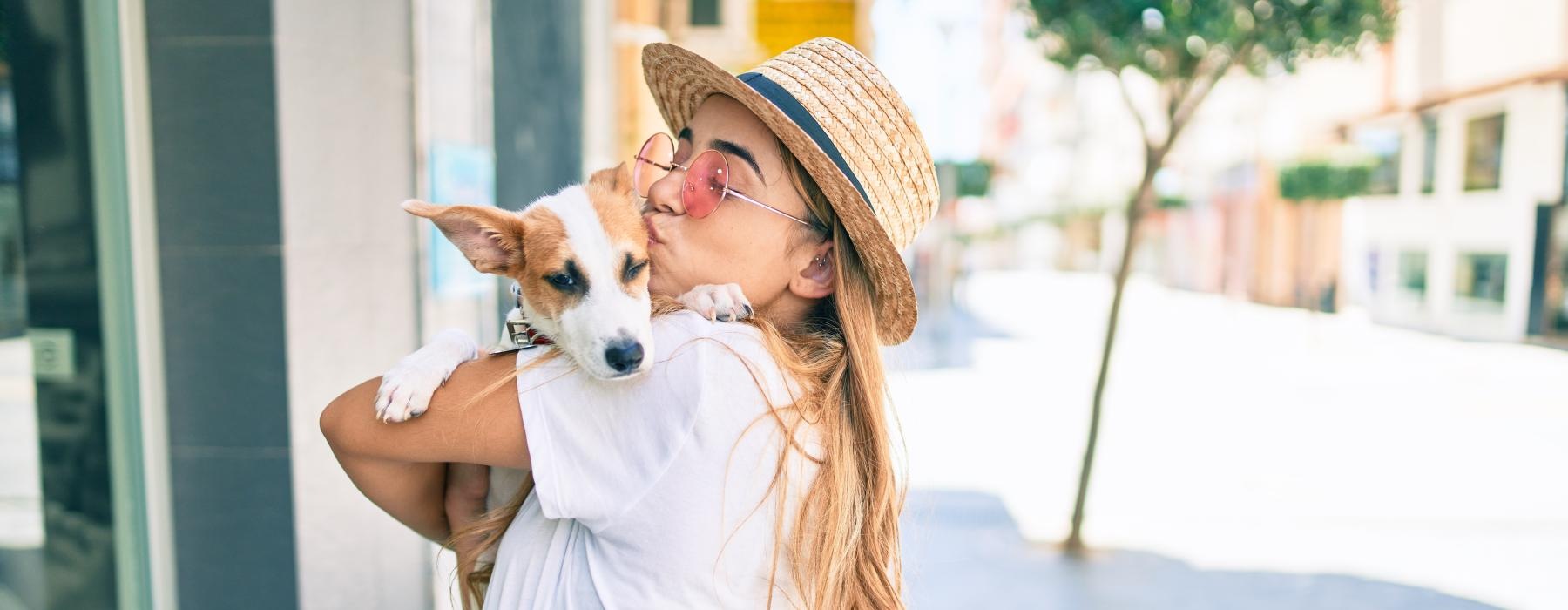 a person holding a dog